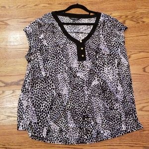 Gray, black and white animal print with gold butto